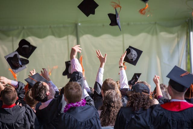 graduates celebrating