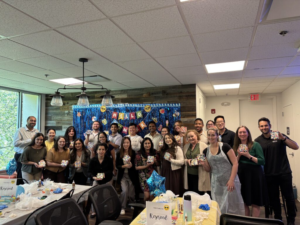 A small team making crafts together at a holiday party