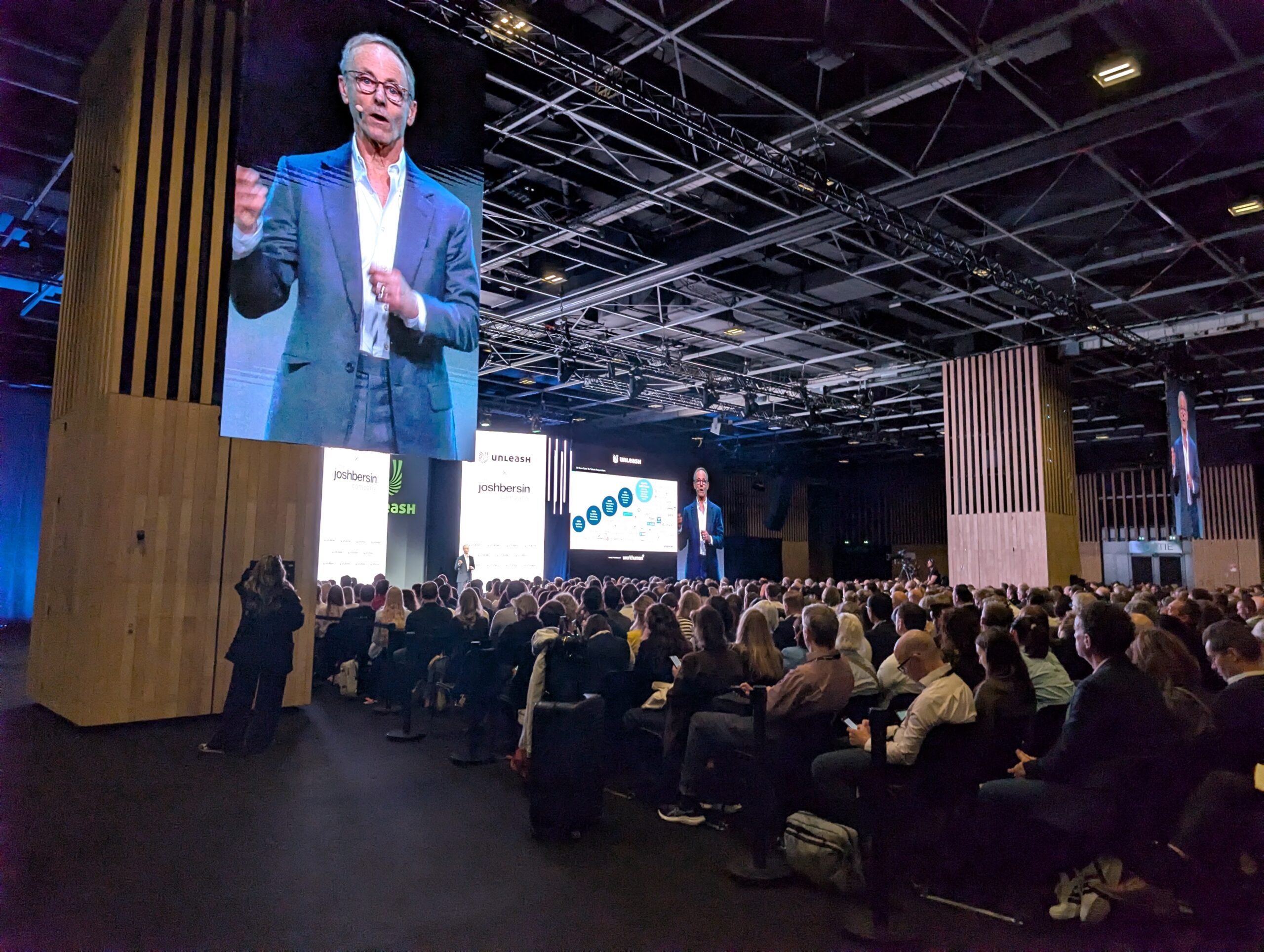 Josh Bersin Keynote at Unleash showing a packed out audience and a big screen